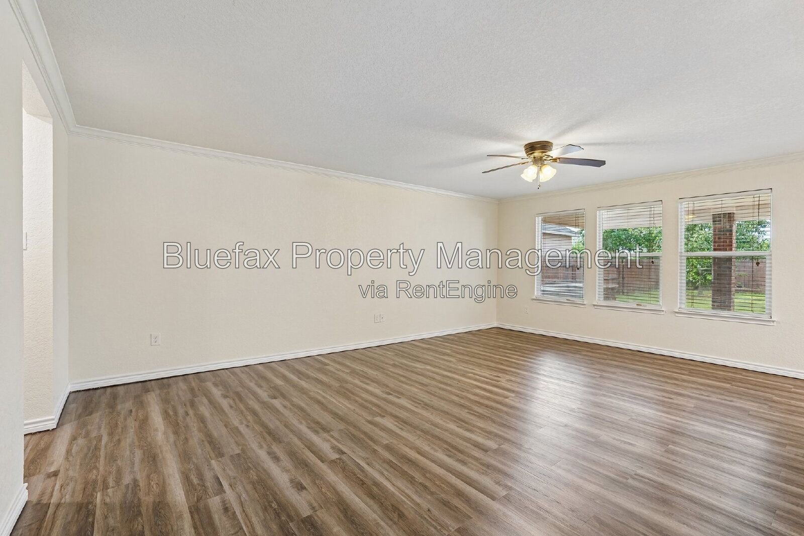 HUGE Covered Patio with Built In Counters, a Refrigerator and a Place for Your Grill! property image