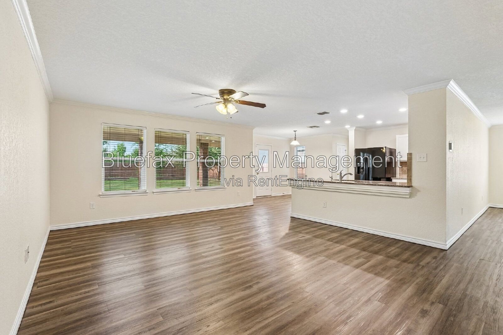 HUGE Covered Patio with Built In Counters, a Refrigerator and a Place for Your Grill! property image